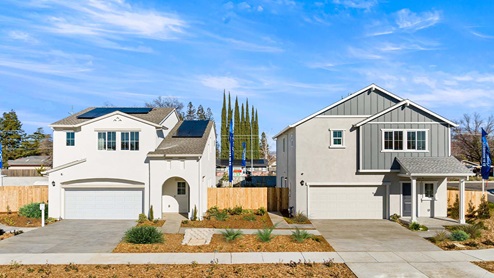 Amber Lynn Estates A couple of two-story homes with covered porches and two-car garage.