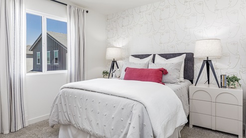 Comfortable bedroom with paned window