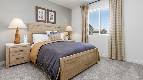 Comfortable bedroom with paned window