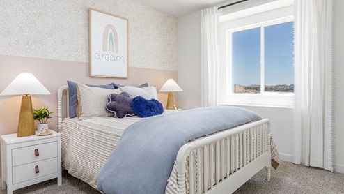 Comfortable bedroom with paned window