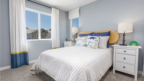 Comfortable bedroom with paned window