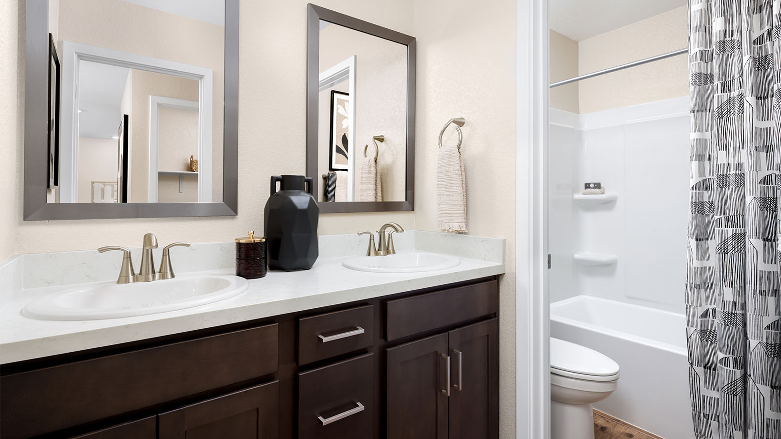 Ibiza at Delta Shores Alta Plan 2617 secondary bathroom with dual sinks and tub with shower