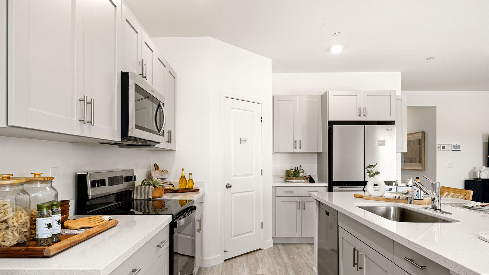 Magnolia at Shastina Ranch Plan 2035  modern kitchen with quartz counter tops