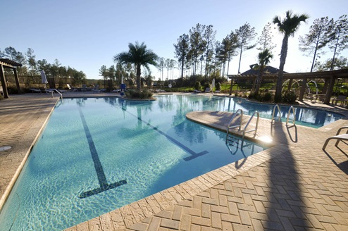Zero-entry, resort-style pool with water fountains.