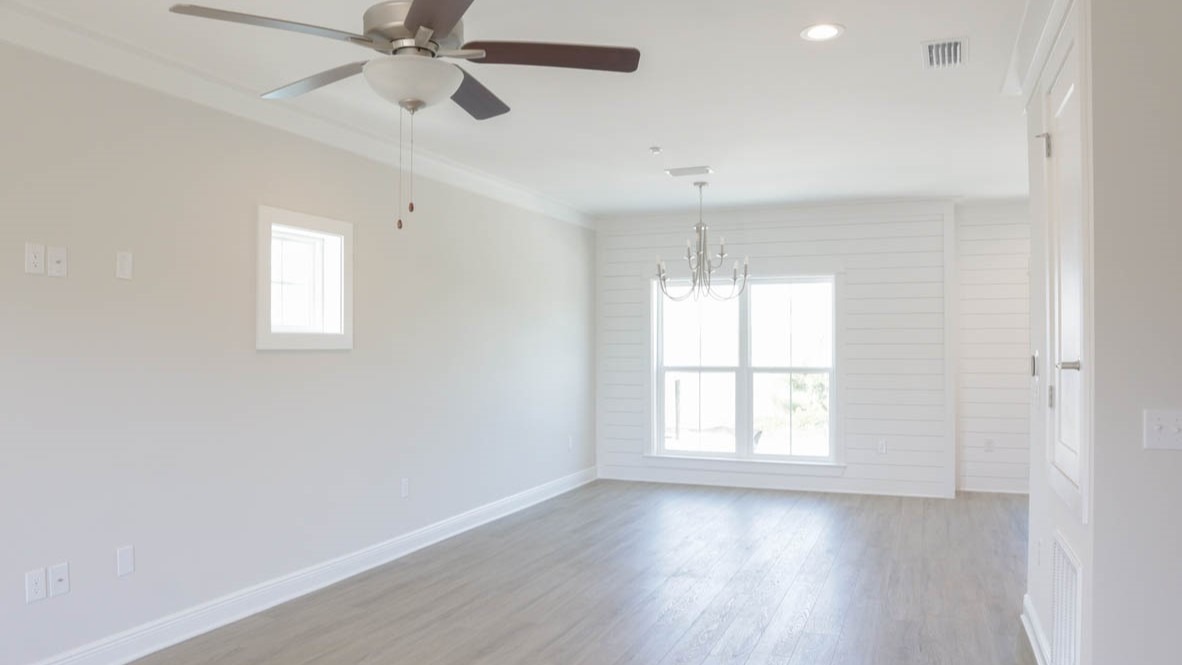 Open concept living area with bountiful natural light.