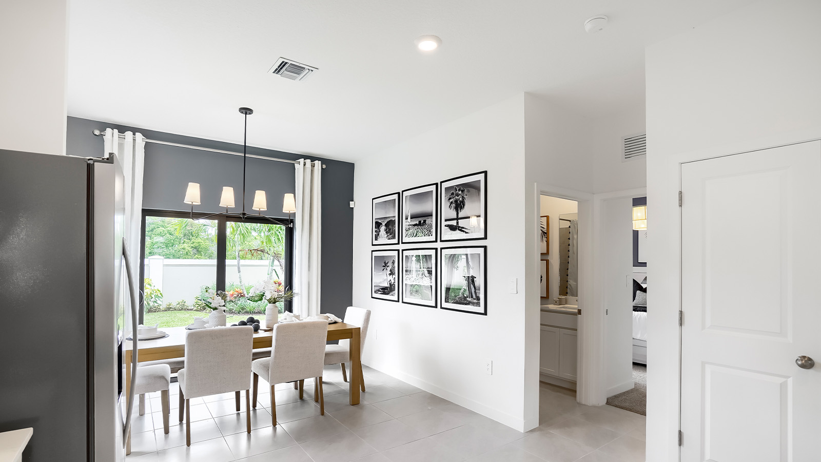 dining room area with sliding glass access to backyard