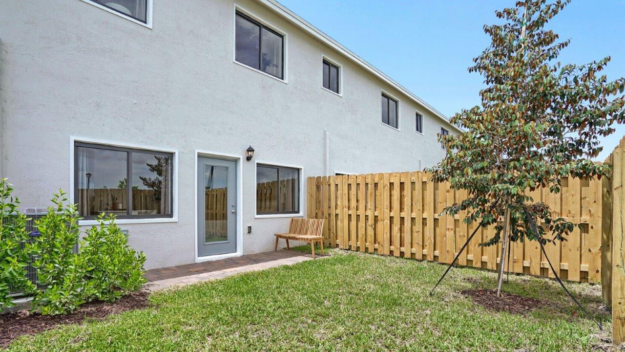 patio and rear exterior of home