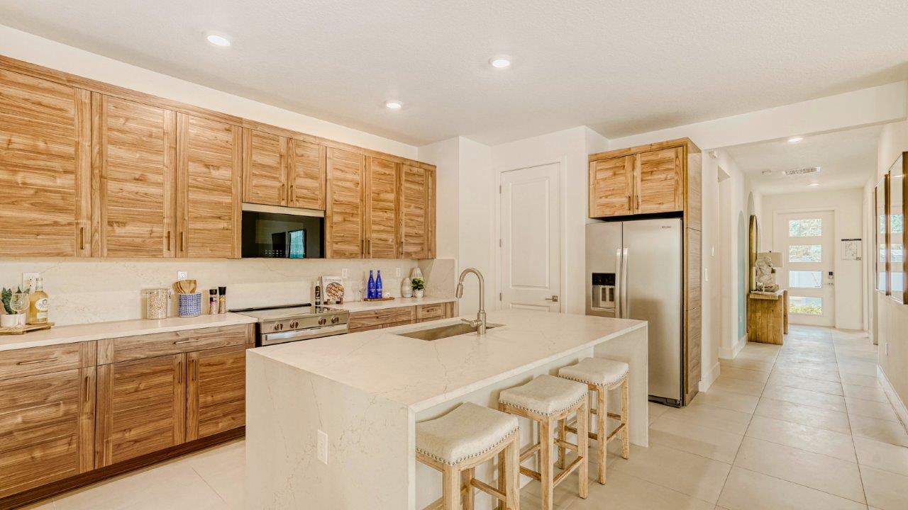 merritt model open concept kitchen with waterfall island