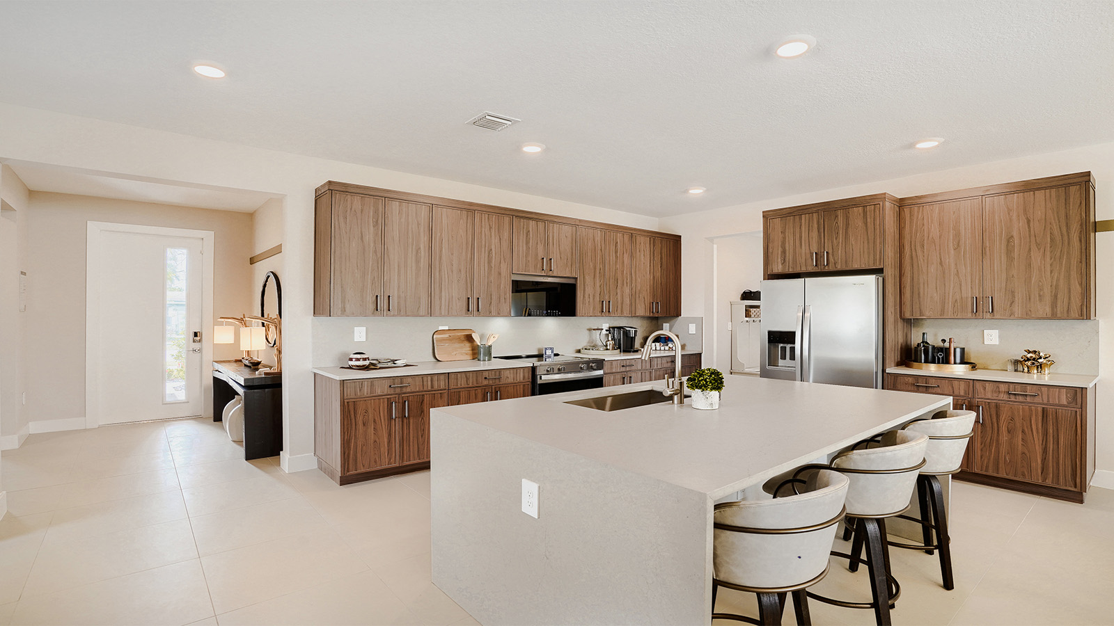 kitchen area with waterfall island