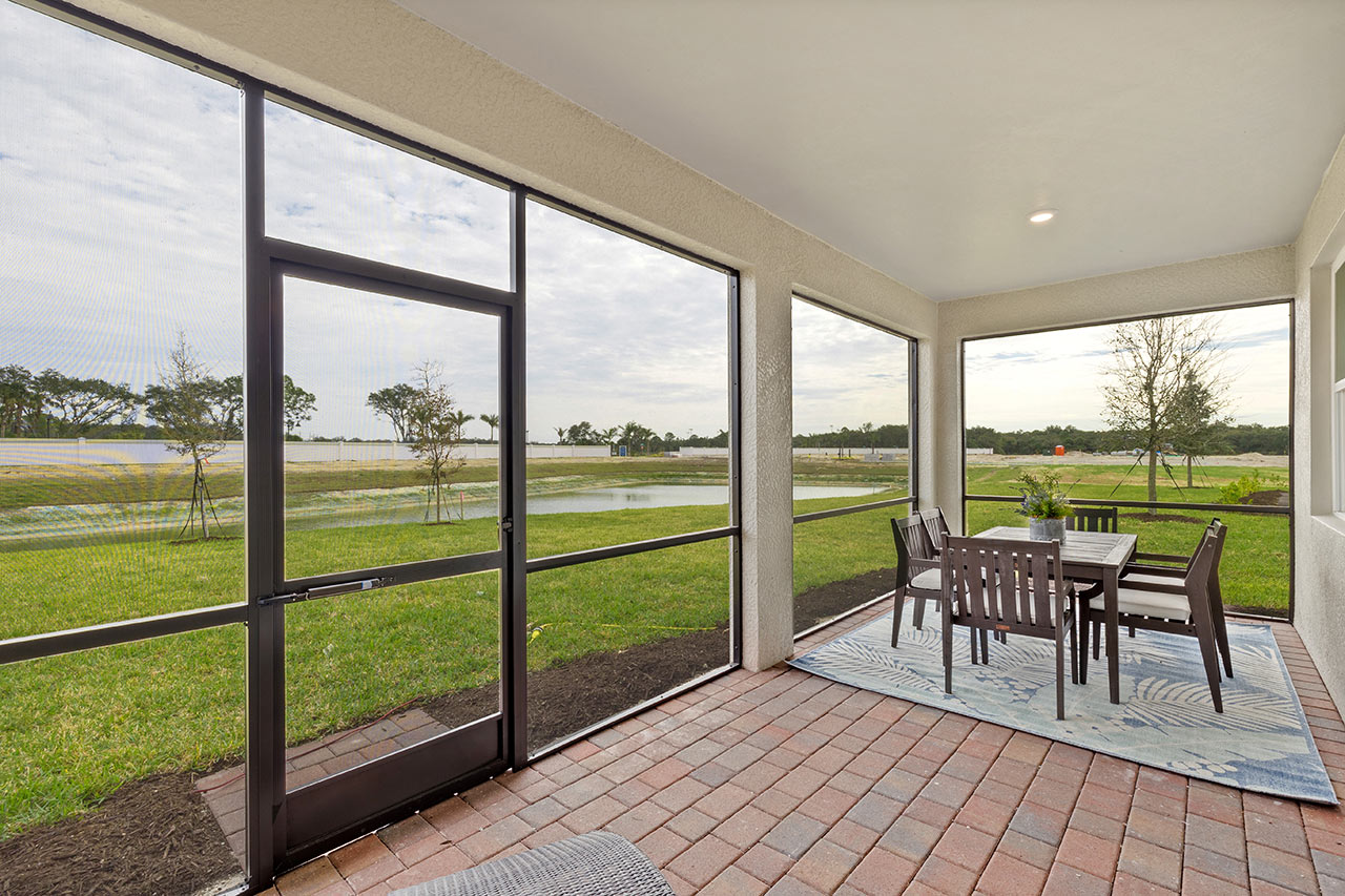Outside of the Delray Model's covered and screened in lanai