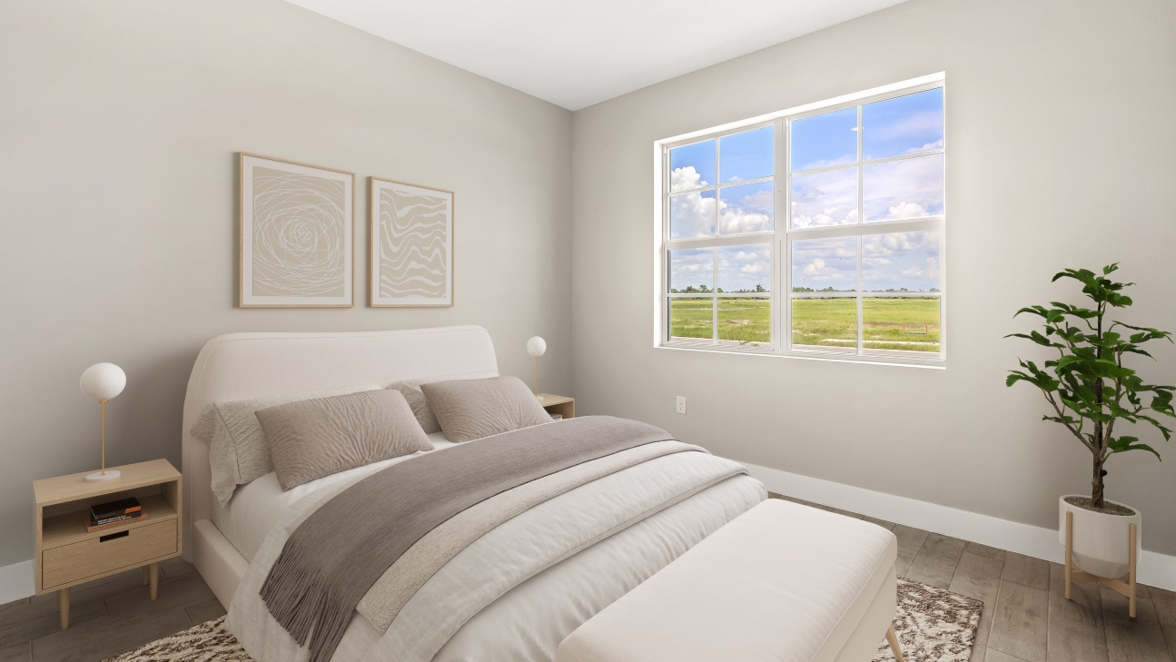 Inside of the Shelby model secondary bedroom. Window for natural light. Room for nightstands and decor.