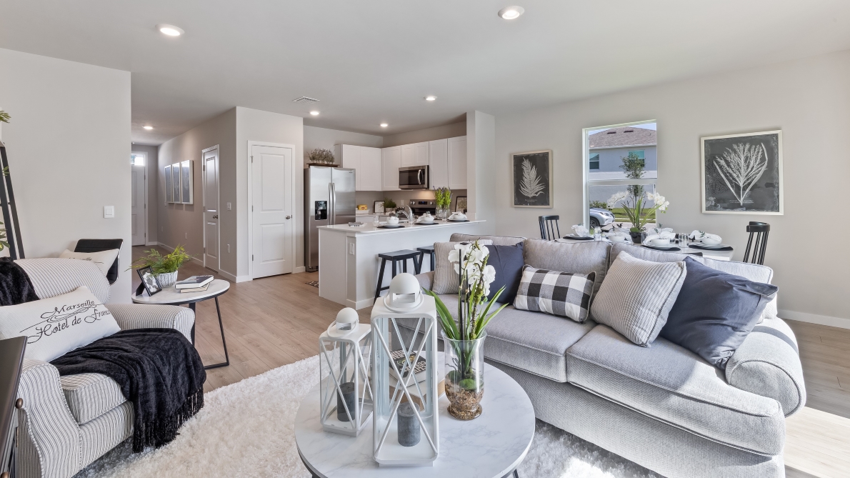 Another angle of the Pearson living room. This angle shows how the living room connects to the kitchen and hallway.