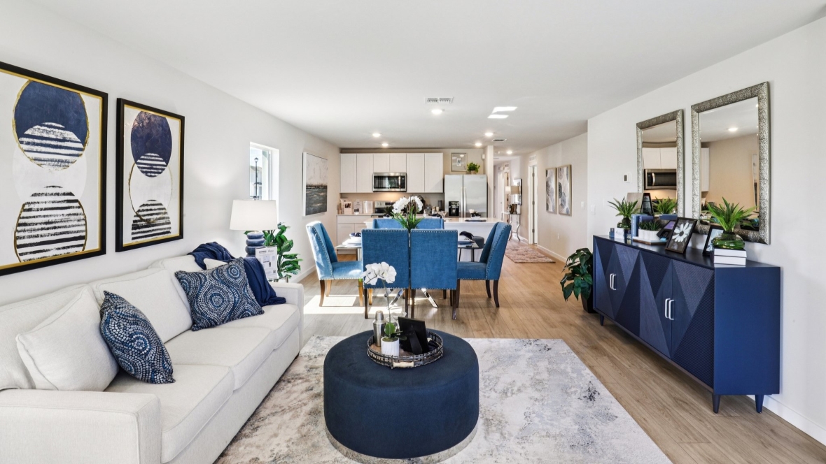 Inside of the Cameron B model living area. Revwood floors and white walls.