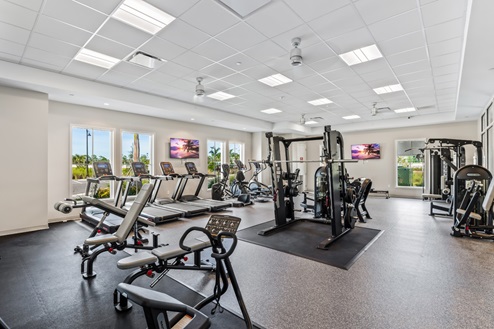 Amenity center fitness center with weight lifting machines and cardio machines