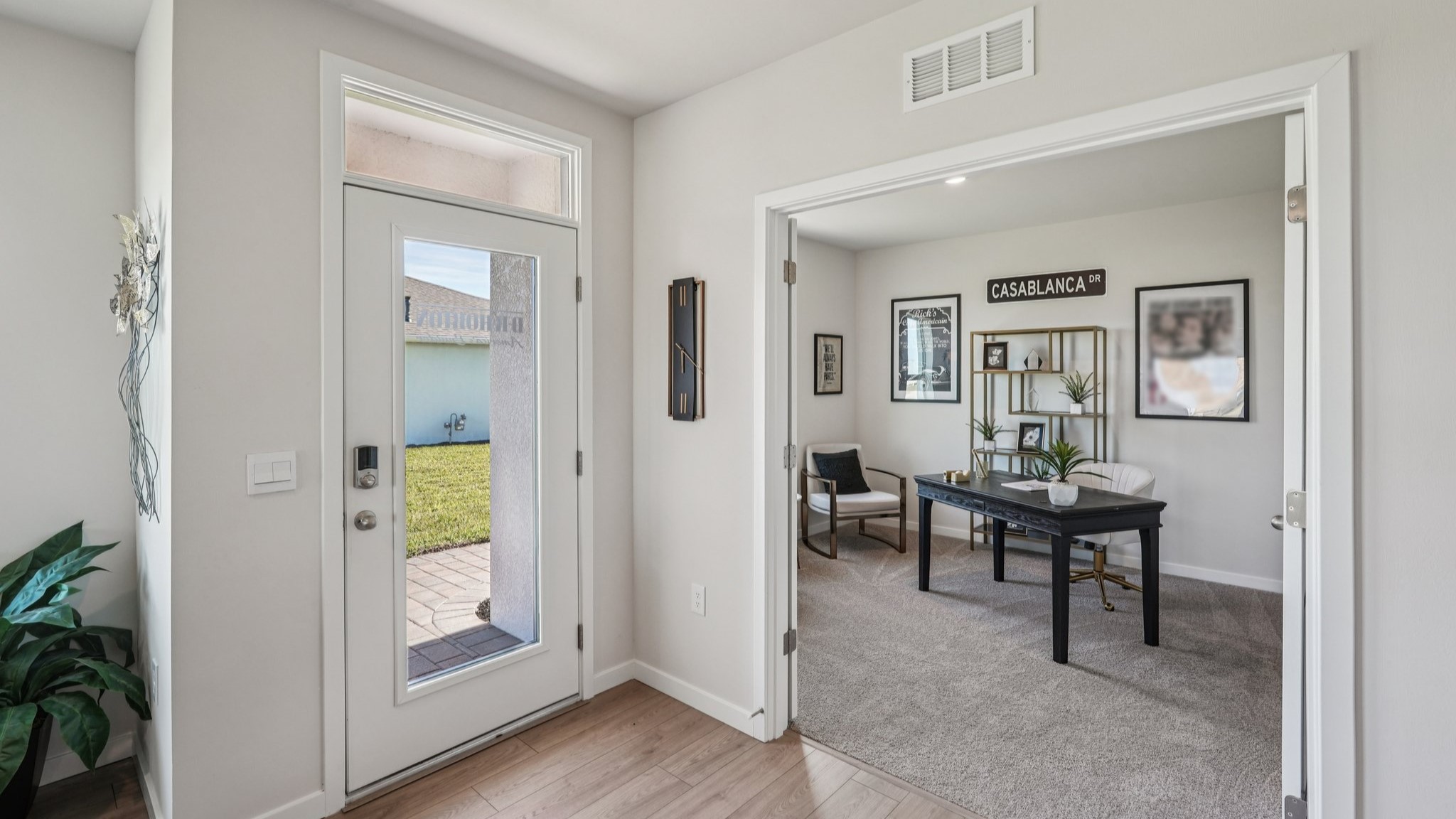 Front entrance of the Varrington model. Door connects to hallway and front office/den space.