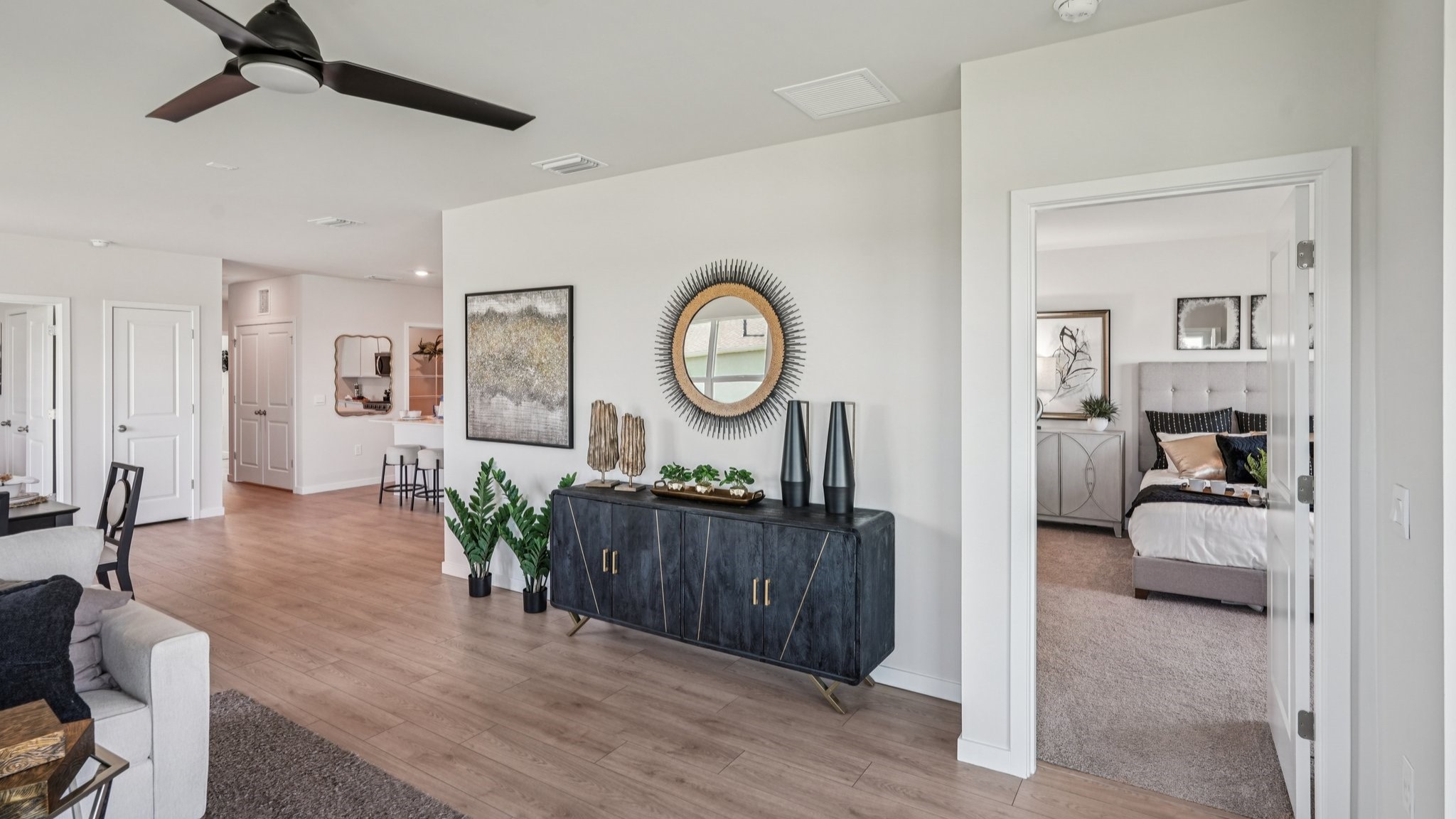 Another angle of the Carrington living room. This angle shows how the room connects to several rooms and a hallway.