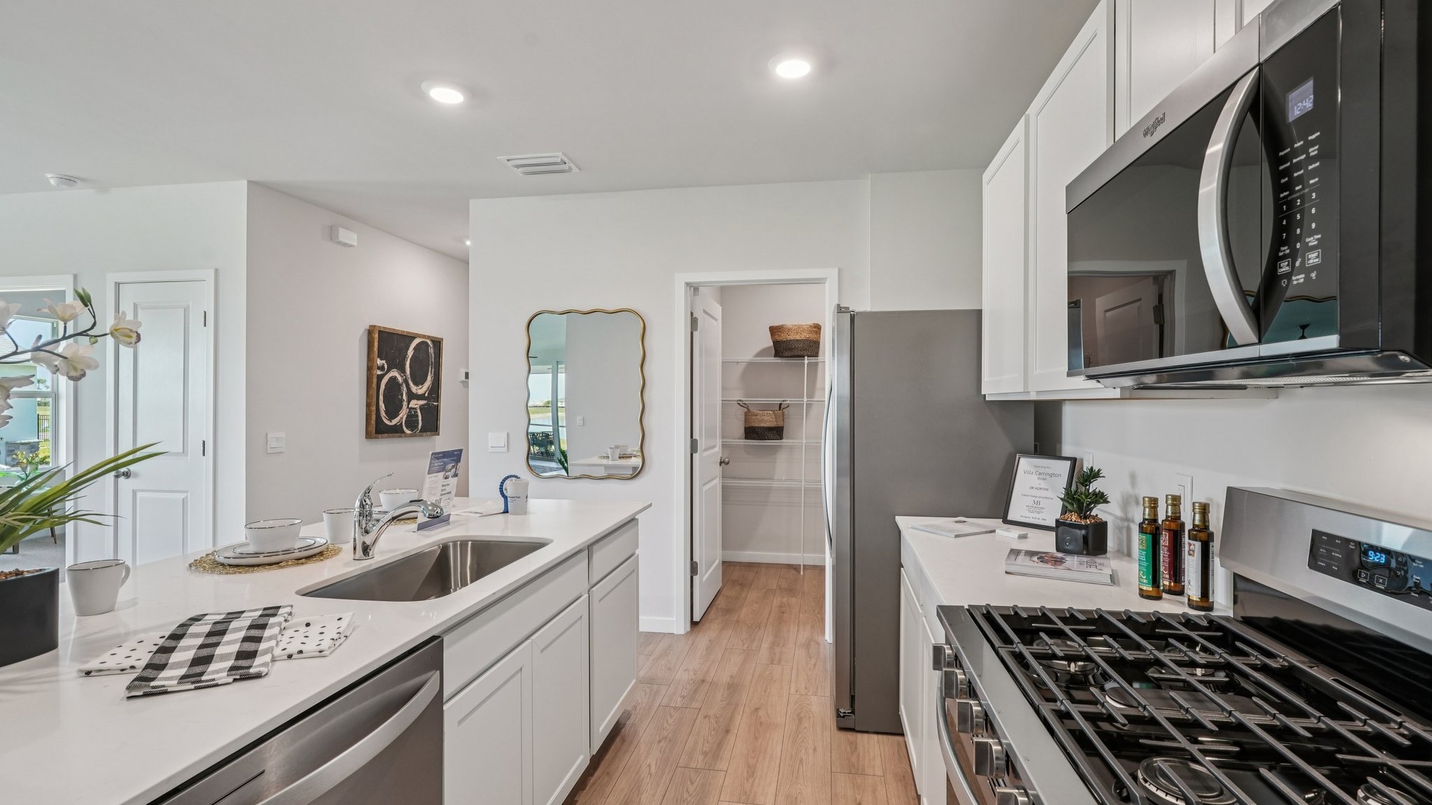Another angle of the Carrington kitchen. This angle shows how the kitchen connects to the pantry and a hallway.