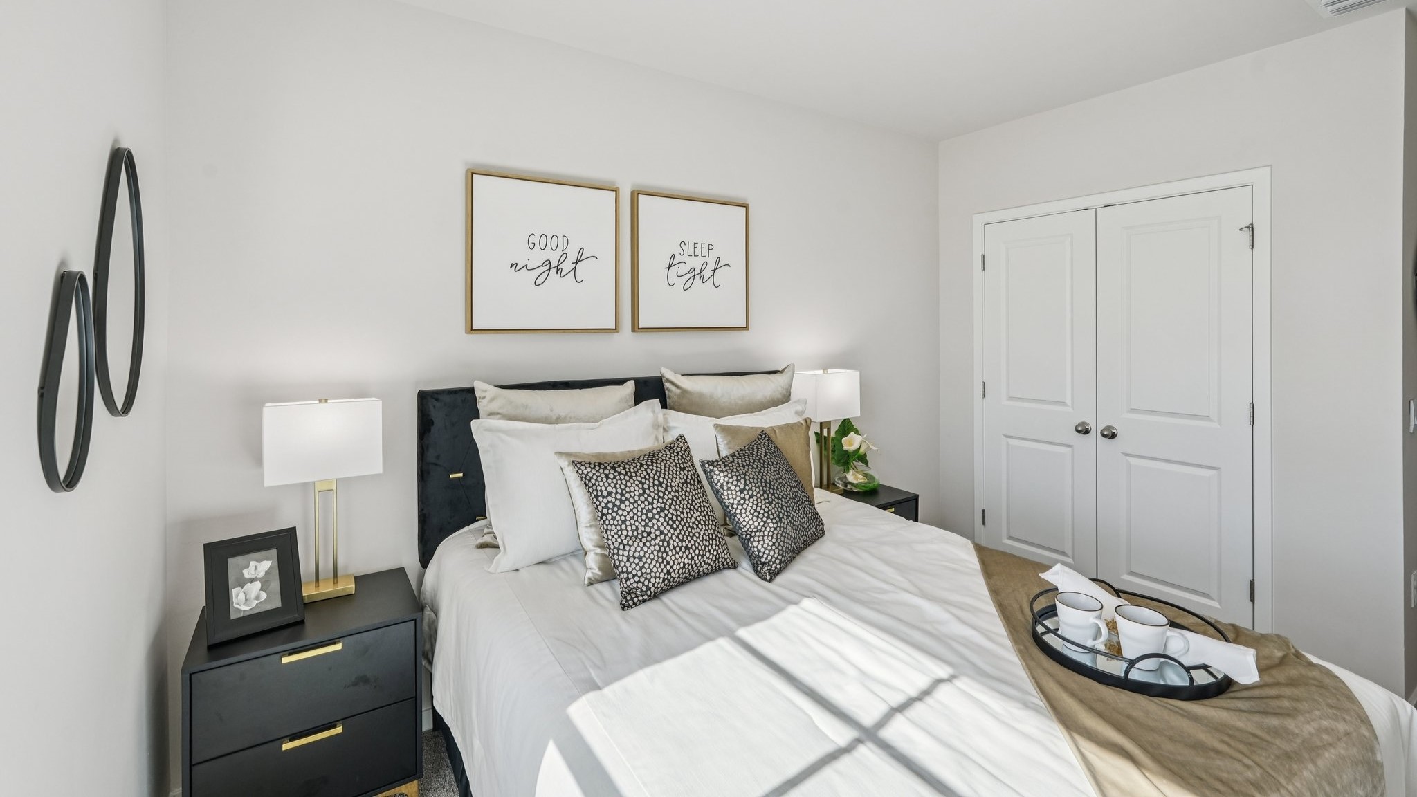 Another angle of bedroom 1. Shows where the closet is located in the room.