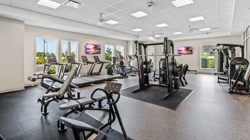 Amenity center fitness center with weight lifting machines and cardio machines