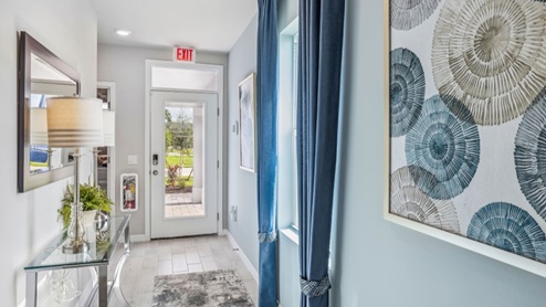 Inside of the Jemison model entry way with glass door.