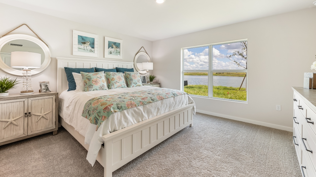 Inside of the primary bedroom. Window for natural lighting.