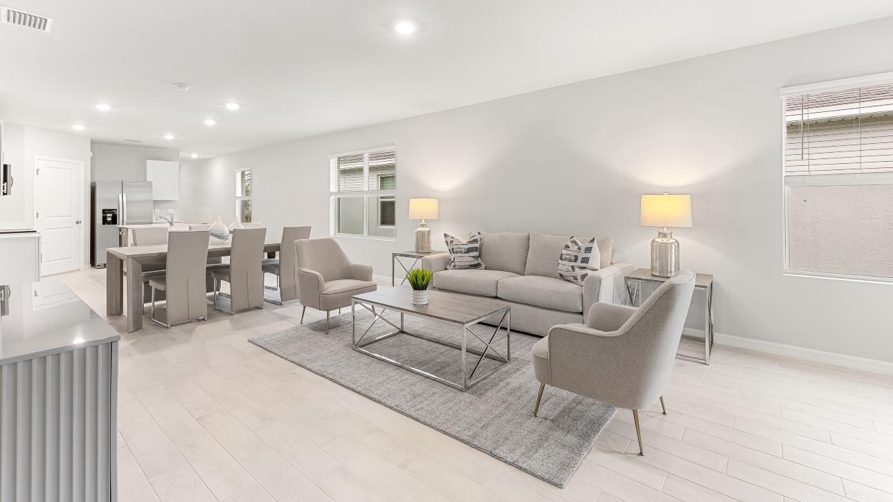 Another angle of the living space. This image shows how the living space is connected to the dining area and kitchen.