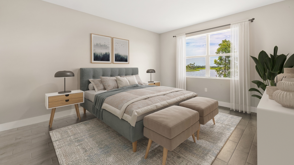 Inside of the Shelby primary bedroom. Window that looks to the outside and brings in natural lighting.