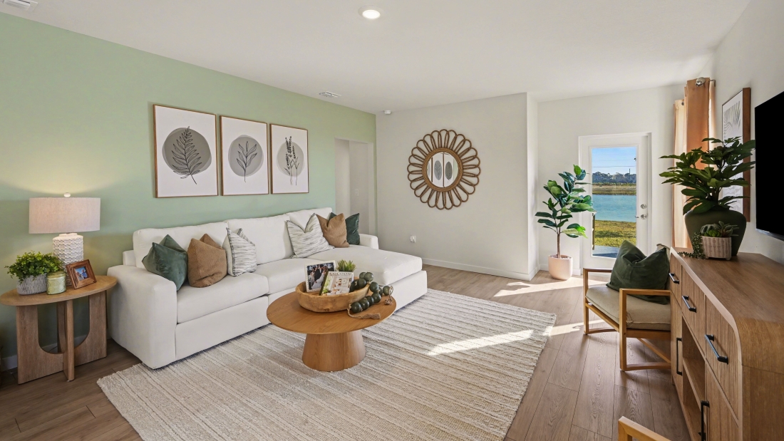 Inside of the Harper model in Central, FL. Living room with patio access to outside.