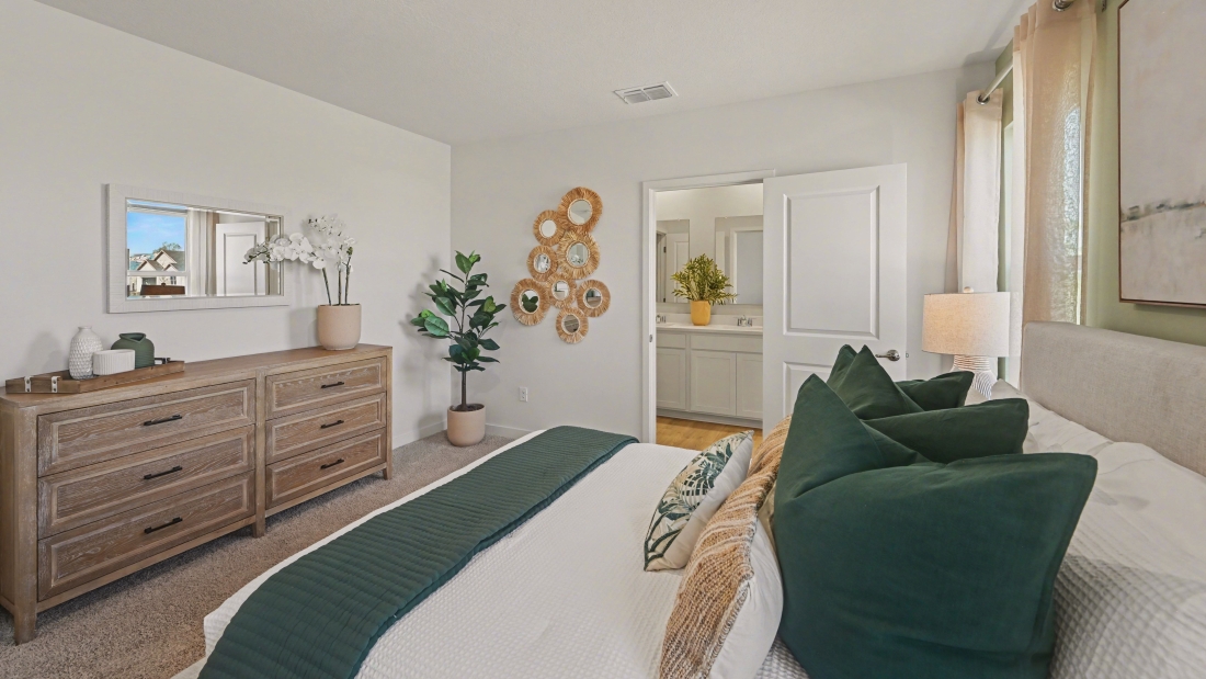 Inside of the Harper model in Central, FL. Primary bedroom