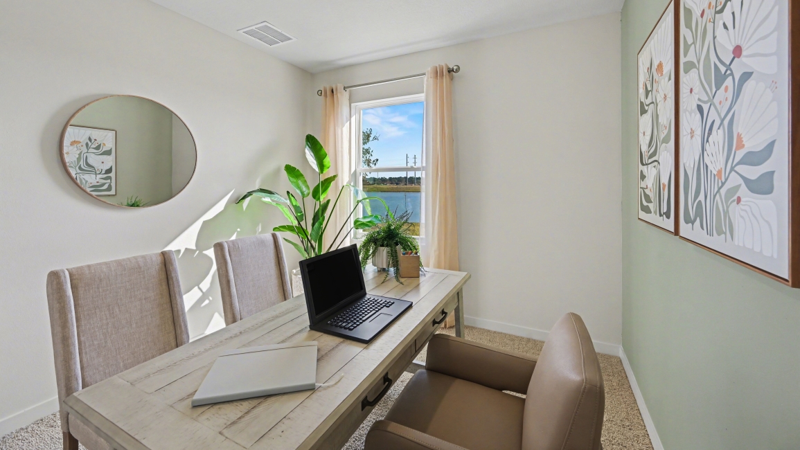 Inside of the Harper model in Central, FL. Office space - Den/Flex room
