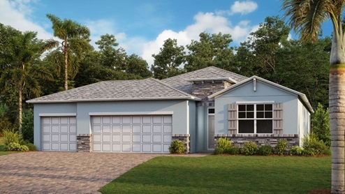 Outside of Delray B model. Blue home with two car garage, one window with shutters, and front door. Mixed paver driveway.