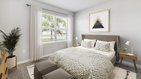 Inside of the Aria bedroom two. Creme carpet with grey walls. Room has a bed with nightstands on either side as well as a dresser and plant on the opposing wall. Room also contains window.