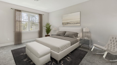 Inside the Clifton primary bedroom with grey walls and grey carpet. One window to the left of the bed. There are two side tables on either side and room for a bench at the foot of the bed.