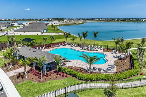 Arial view of the Stonewater amenity center with a large pool and various seating.