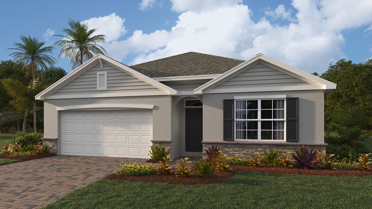 Outside of the Cali model C4 home. Tan home, two car garage, window with shutters, and front door. Mixed paver driveway.
