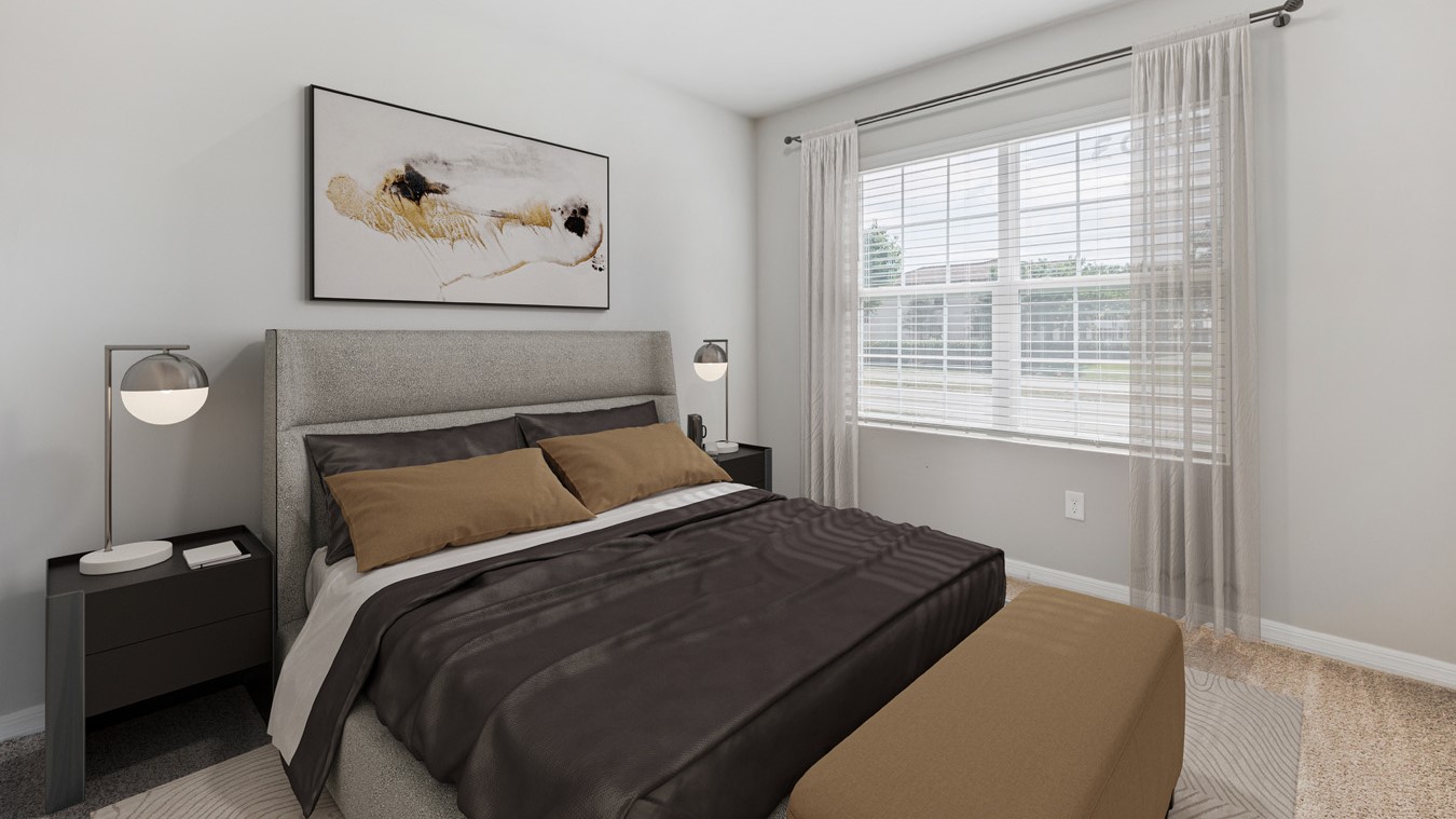 Inside of the Madison bedroom three. Creme carpet and off-white walls. Room contains one bed with two nightstands on either side of the bed. Room also contains a window.