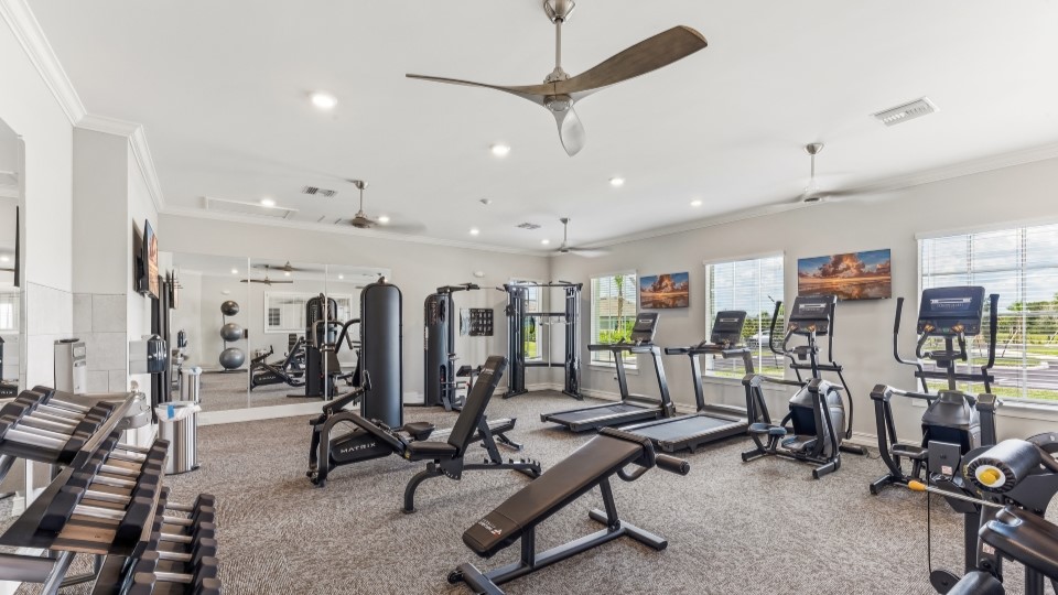 Inside of the gym includes different gym equipment