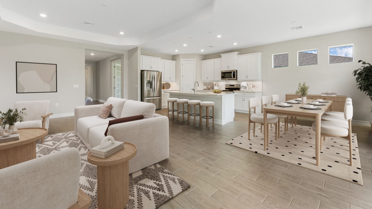 Inside of the Shelby home. Another angle of the dining room, living room, and kitchen.
