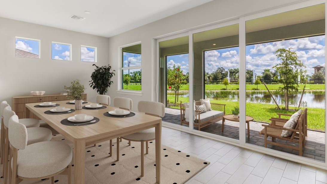 Inside of the Shelby home dining room. The dining room has the view of the lanai and outside.