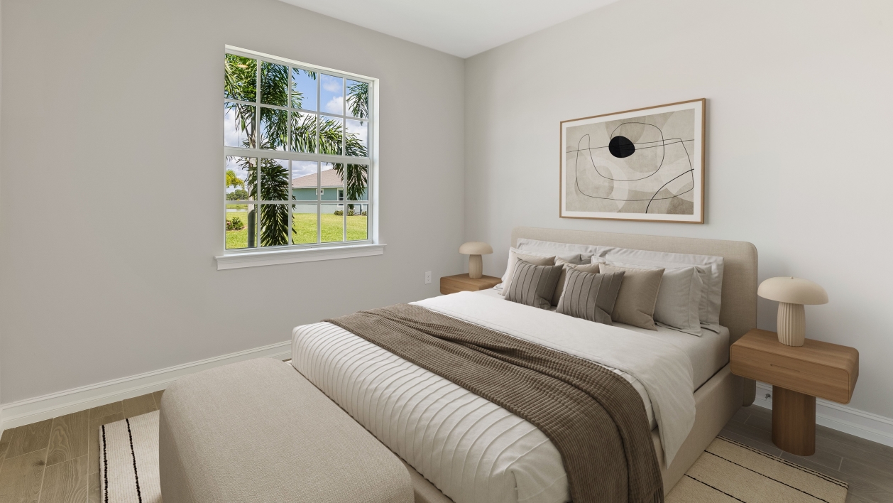 Inside of the Shelby model secondary bedroom. Window for natural light. Room for nightstands and decor.