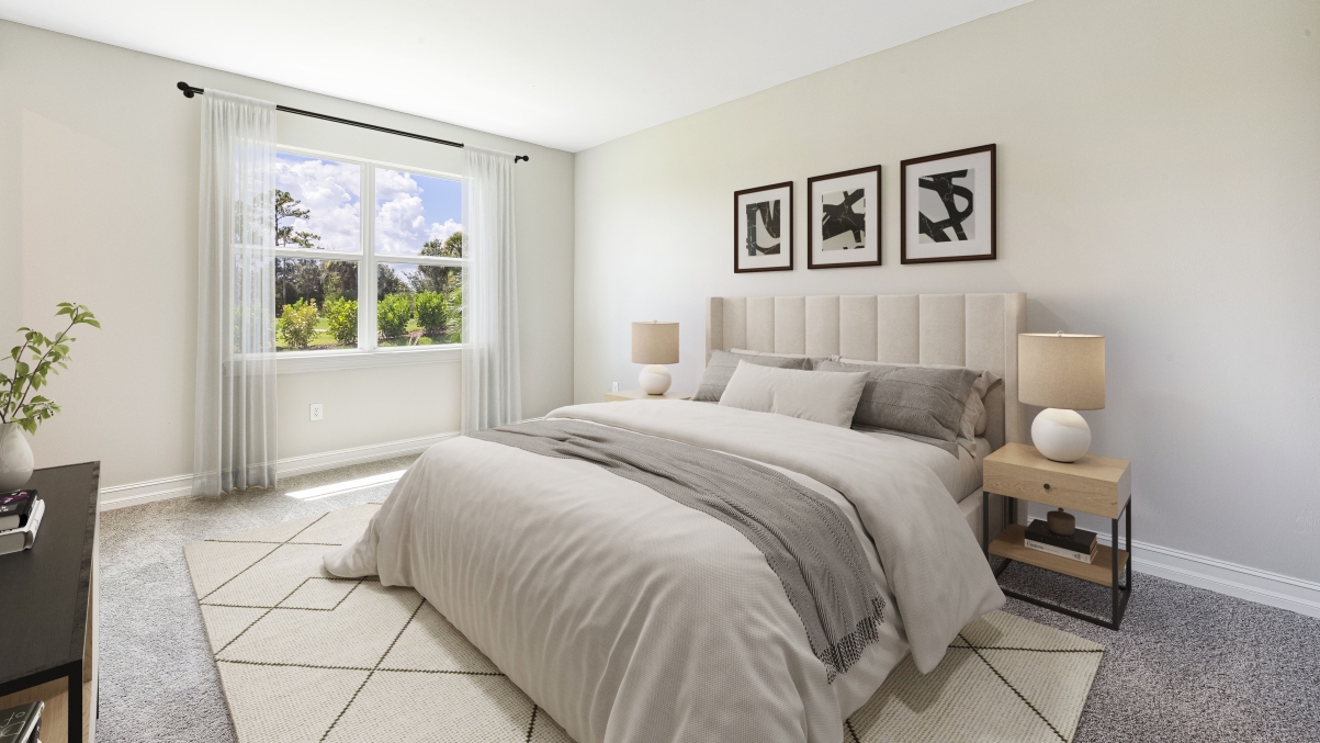 Inside of the Clifton A primary bedroom. Window that brings in natural light. Built in walk in closet.