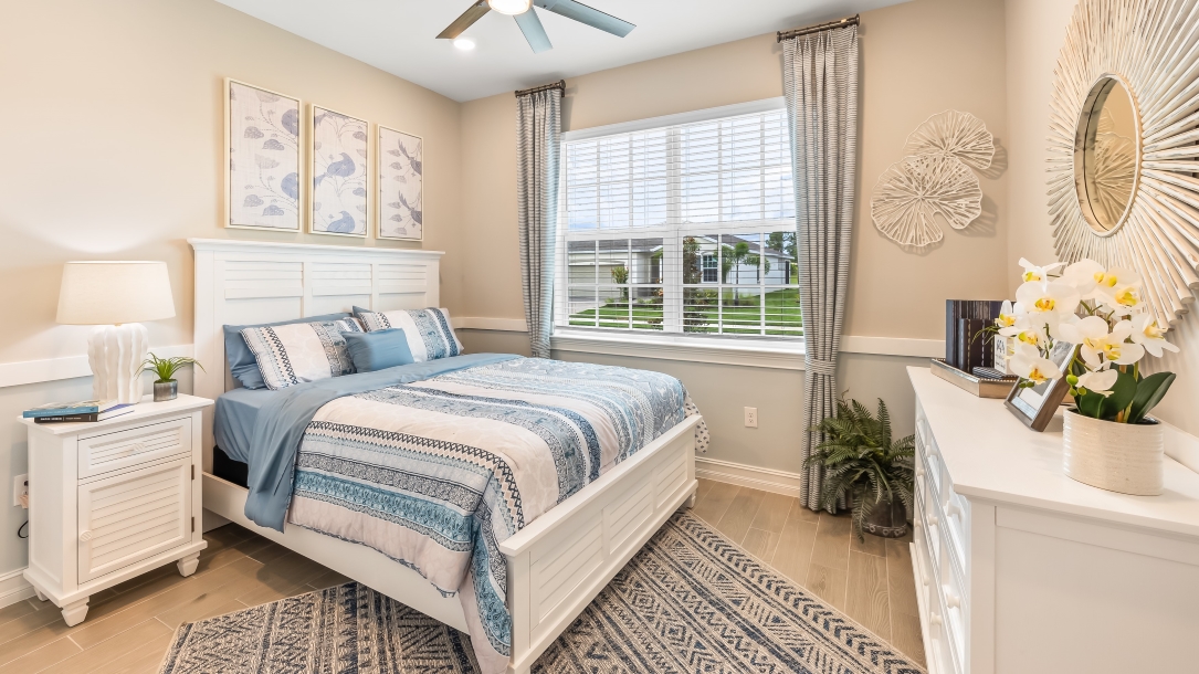 Inside of the secondary bedroom. Closet space and big window that brings natural light.