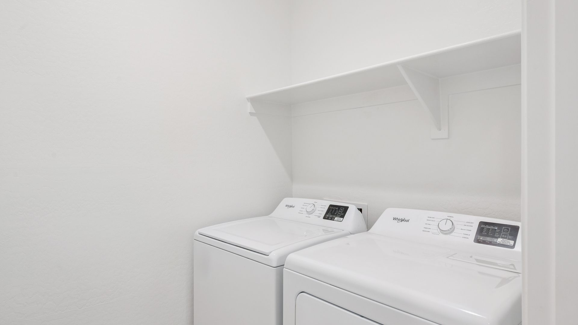 laundry room with shelving