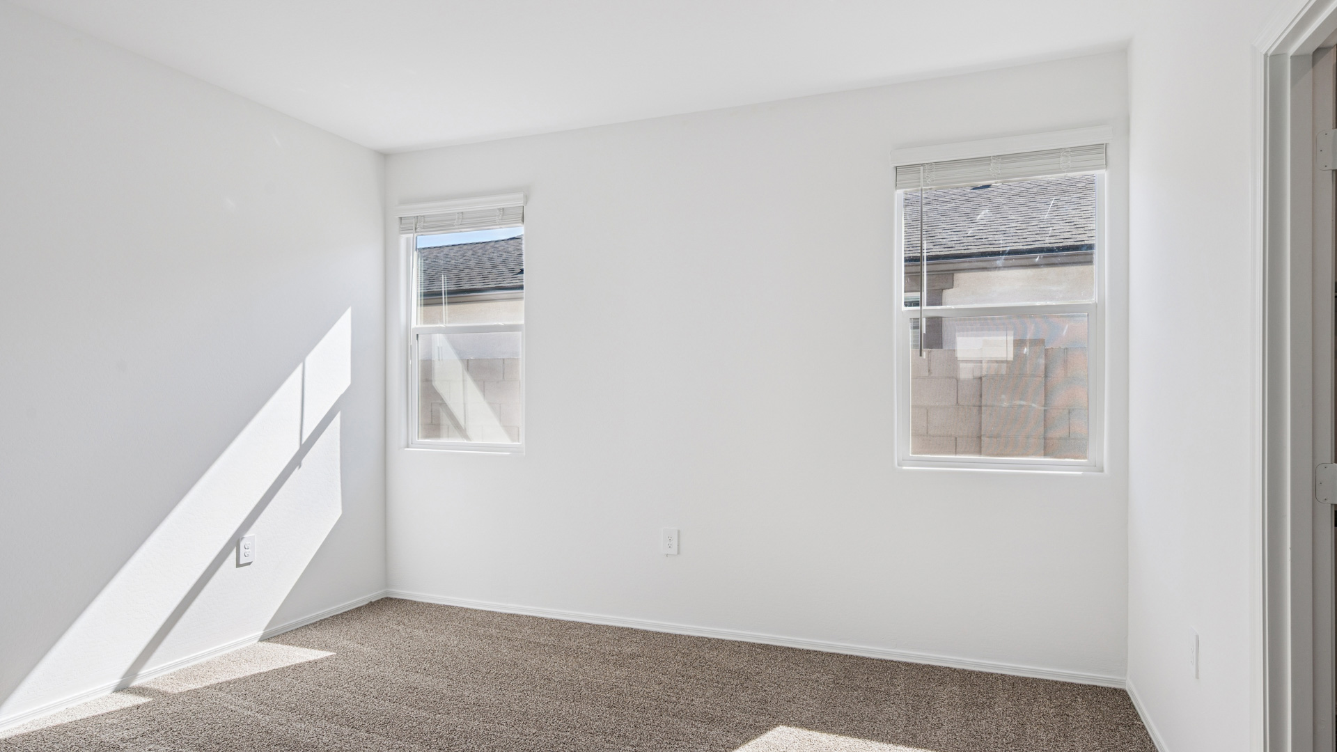 primary suite with walk in closet