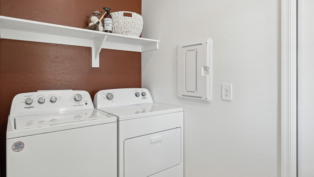 laundry room with shelving