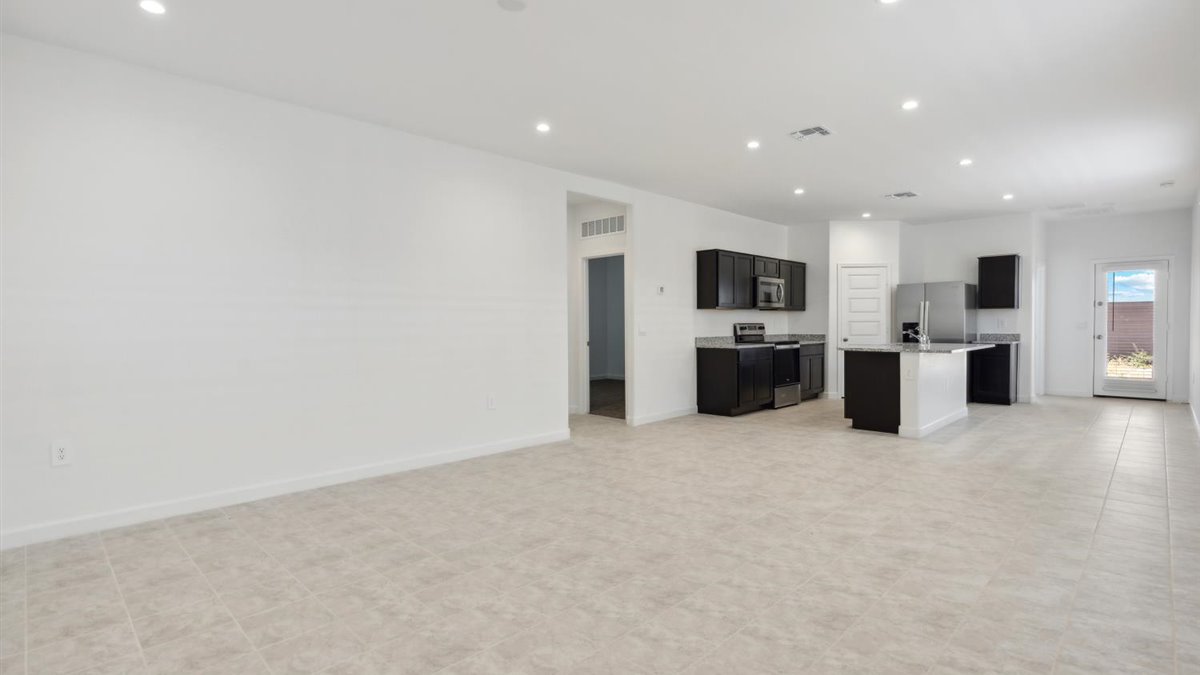 Livingroom overlooking kitchen and hallway