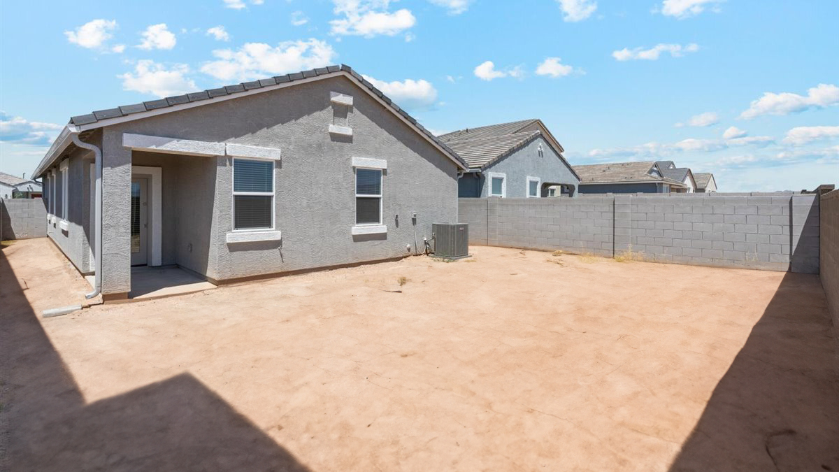 exterior with backyard overlooking side yard