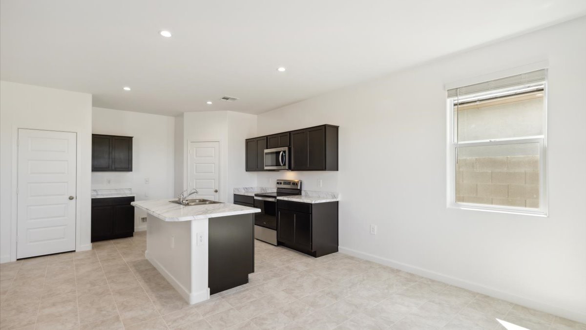 Kitchen with walk-in pantry and storage closet