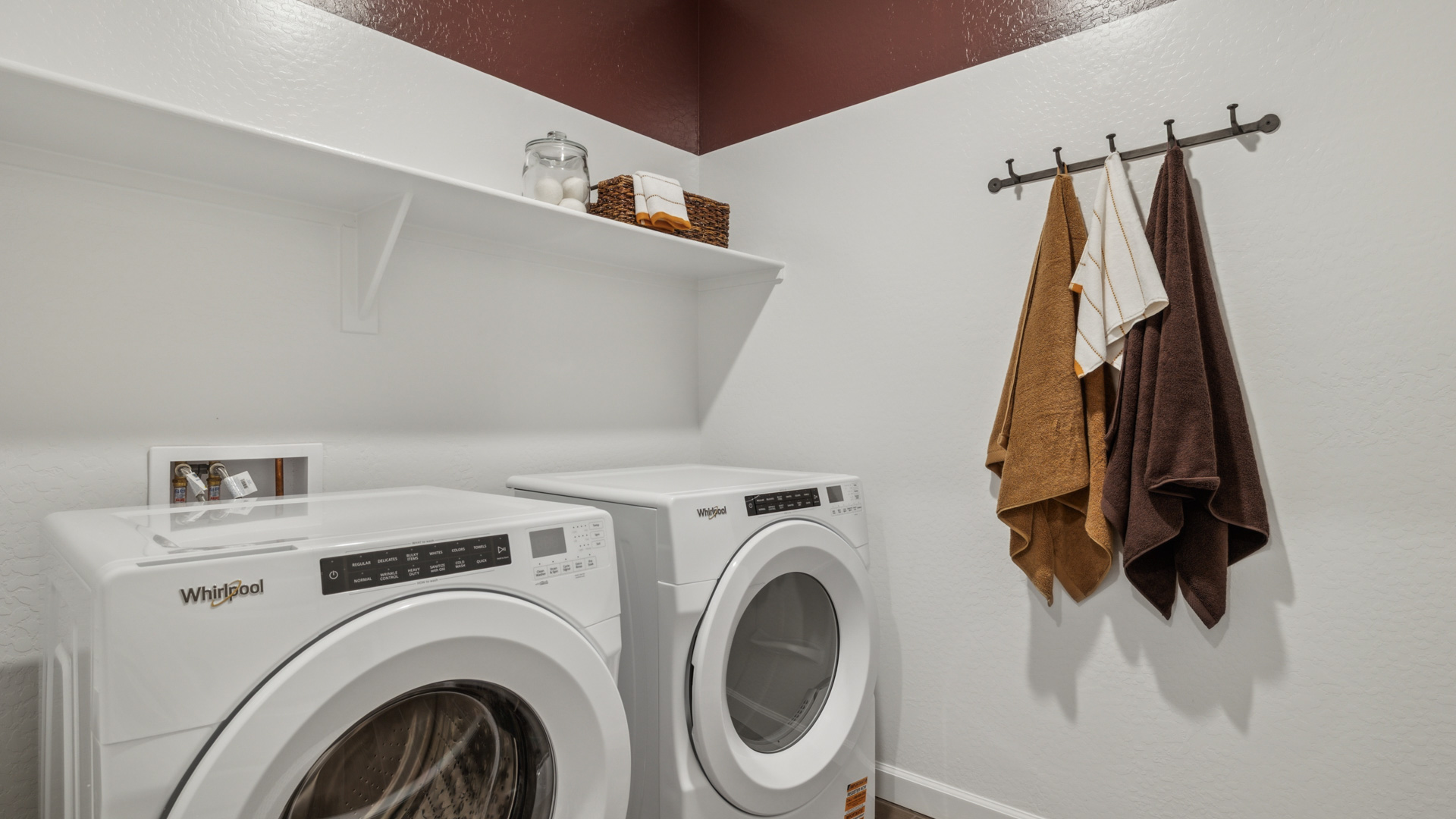 laundry room with shelving
