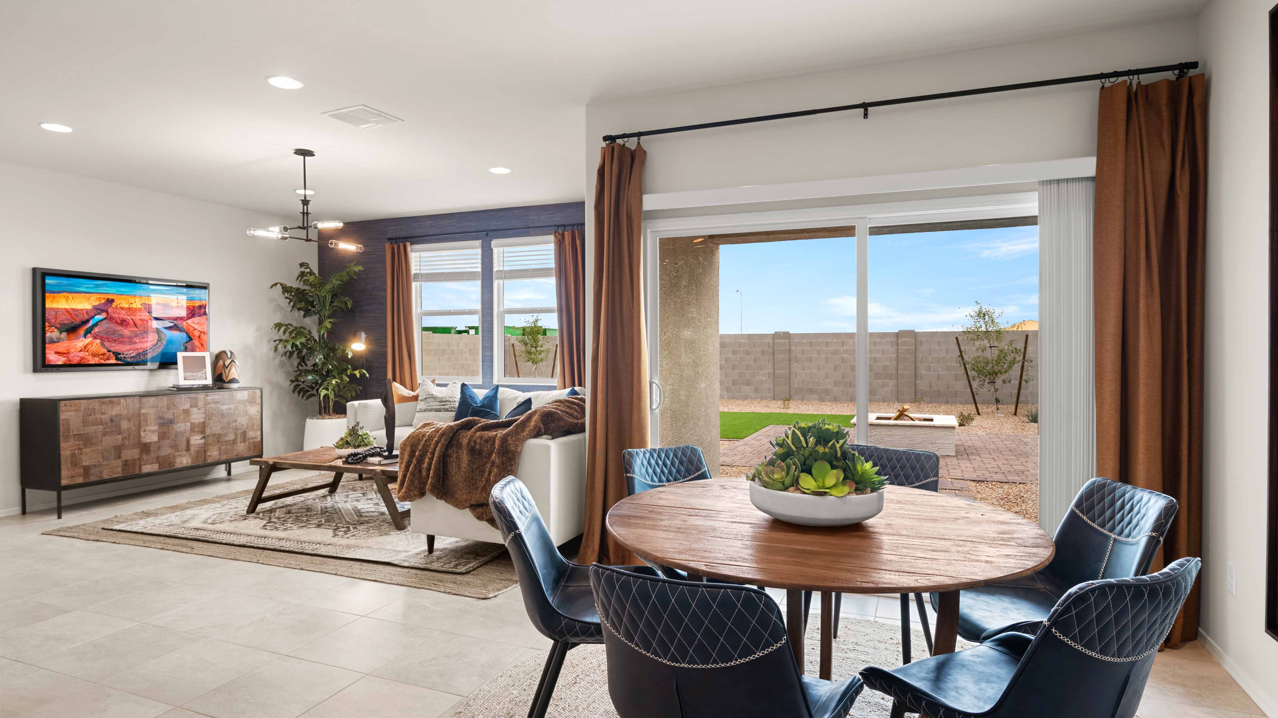Cali dining room with sliding glass door to the backyard
